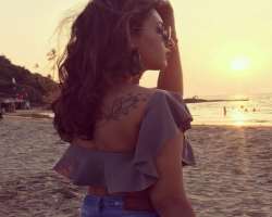 Additi is a tattoo lover and has one butterfly tattoo on her back.